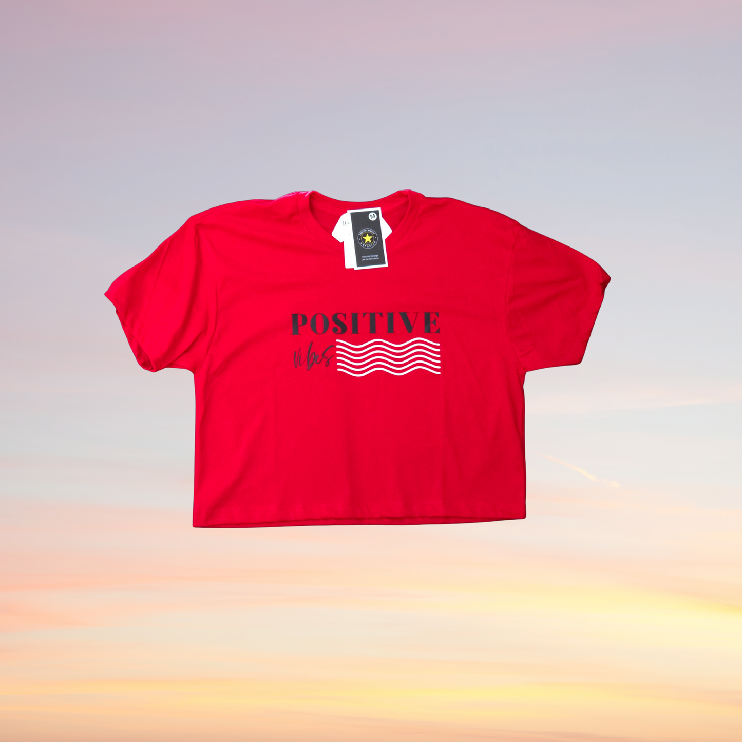 Red t-shirt with 'POSITIVE' text and wave design on a gradient background